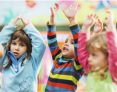 Kids raising hands